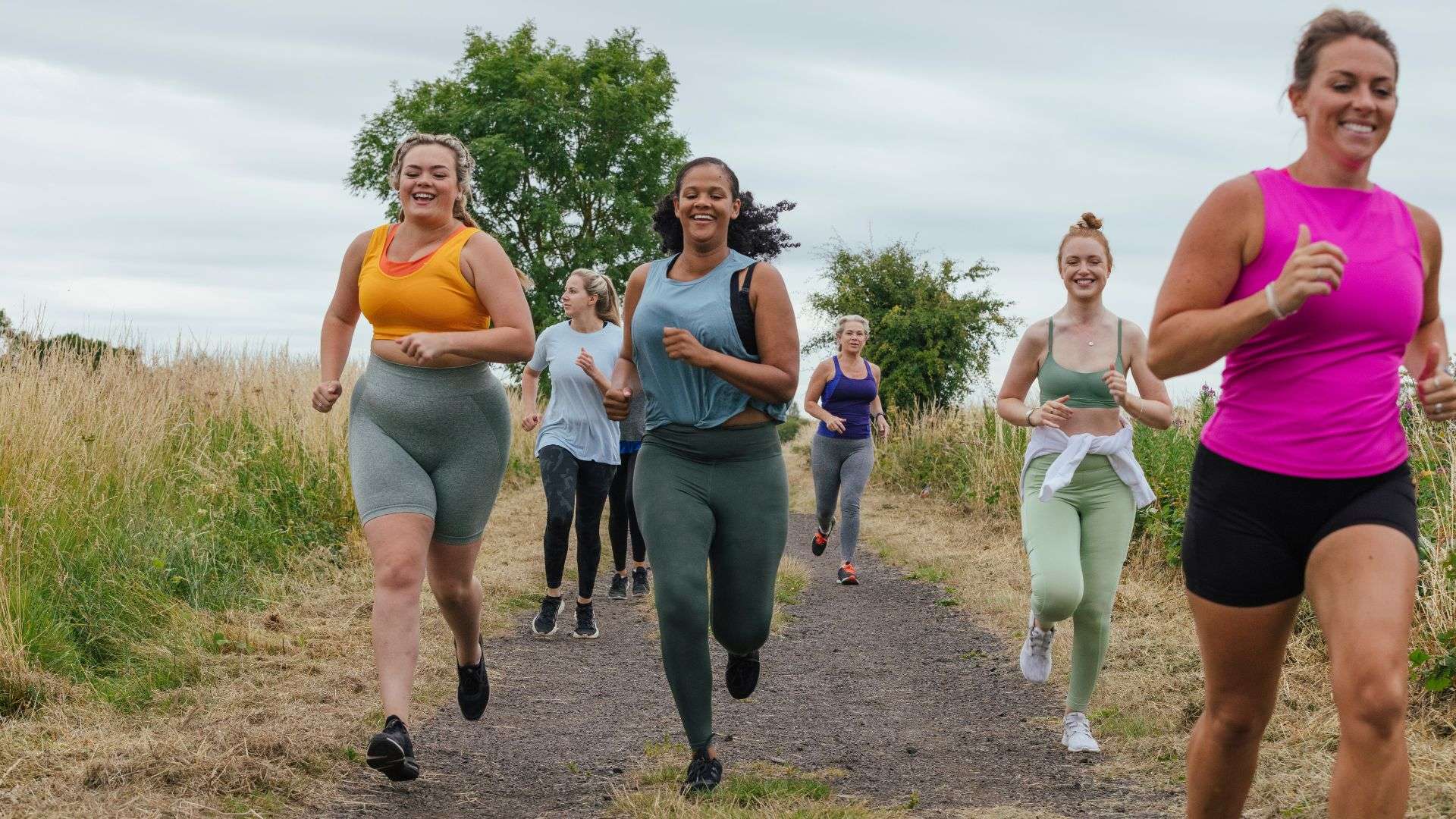 group of woman. jogging and smiling