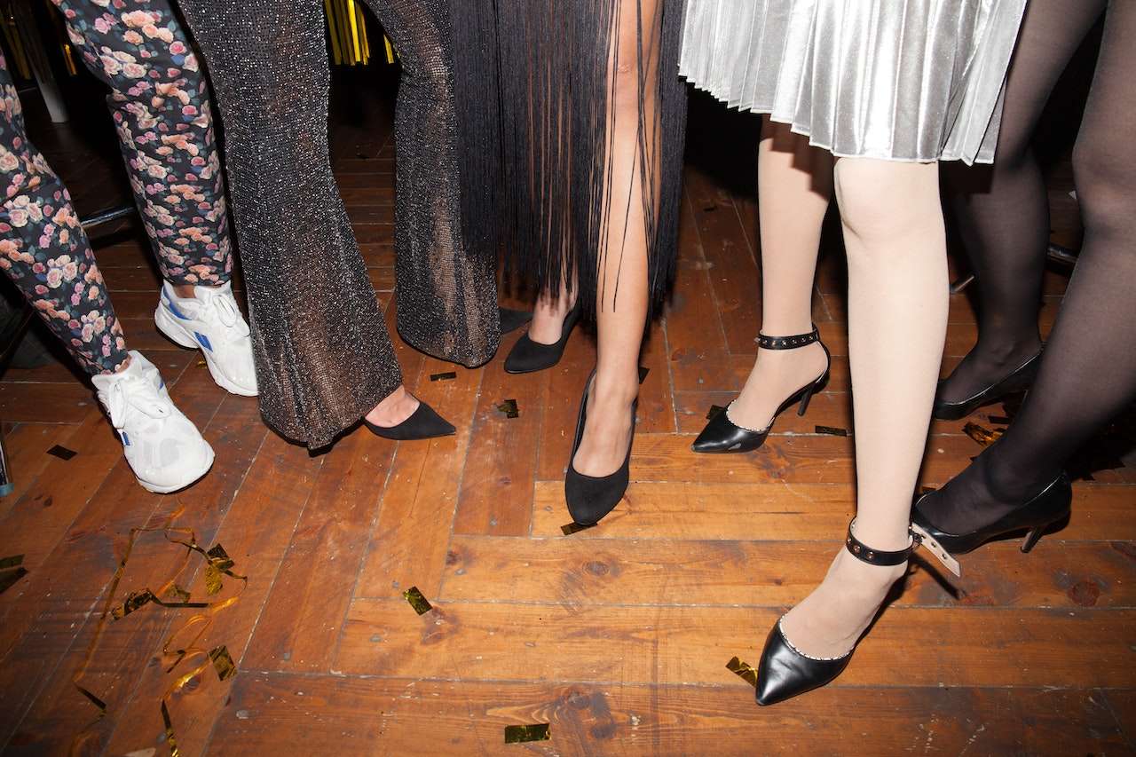 Women in heels at a party