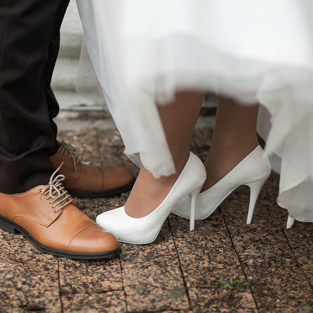 shoes off groom and bride